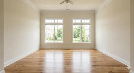 Professional painter cutting in trim in a Delaware home